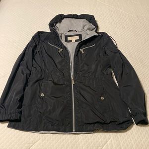 Michael Kors black hooded raincoat with carry bag